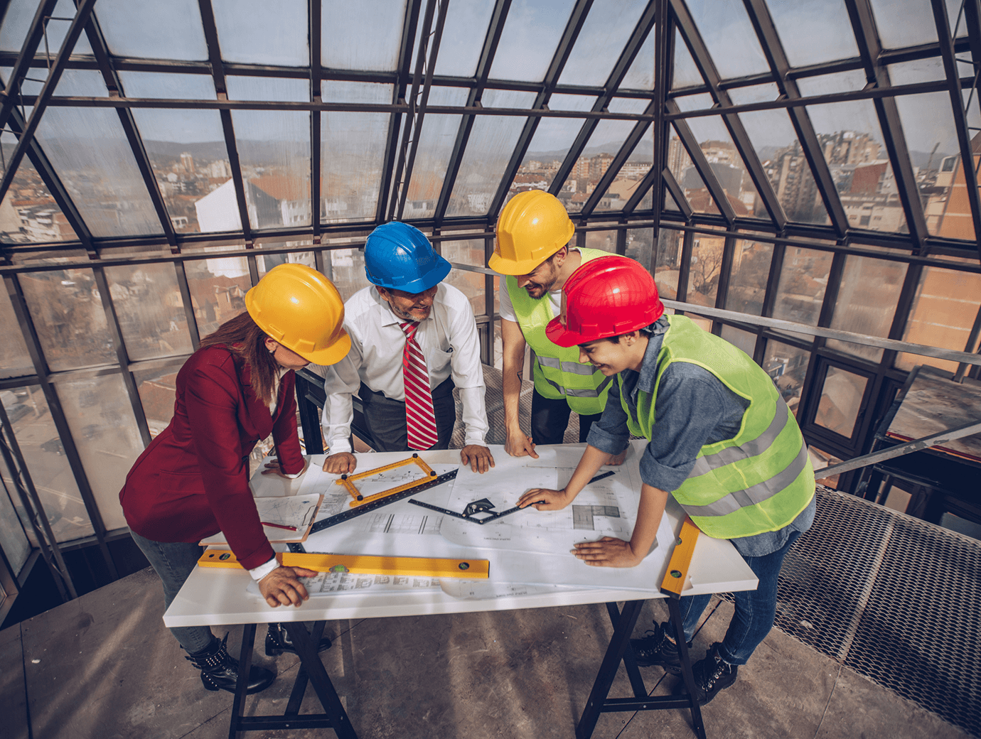 Group of workers analyzing project designs