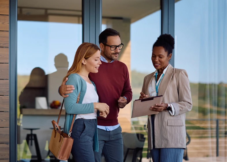 Couple meeting with real estate agent
